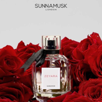 Sunnamusk Zeyara perfume nestled on a bed of glittery red roses